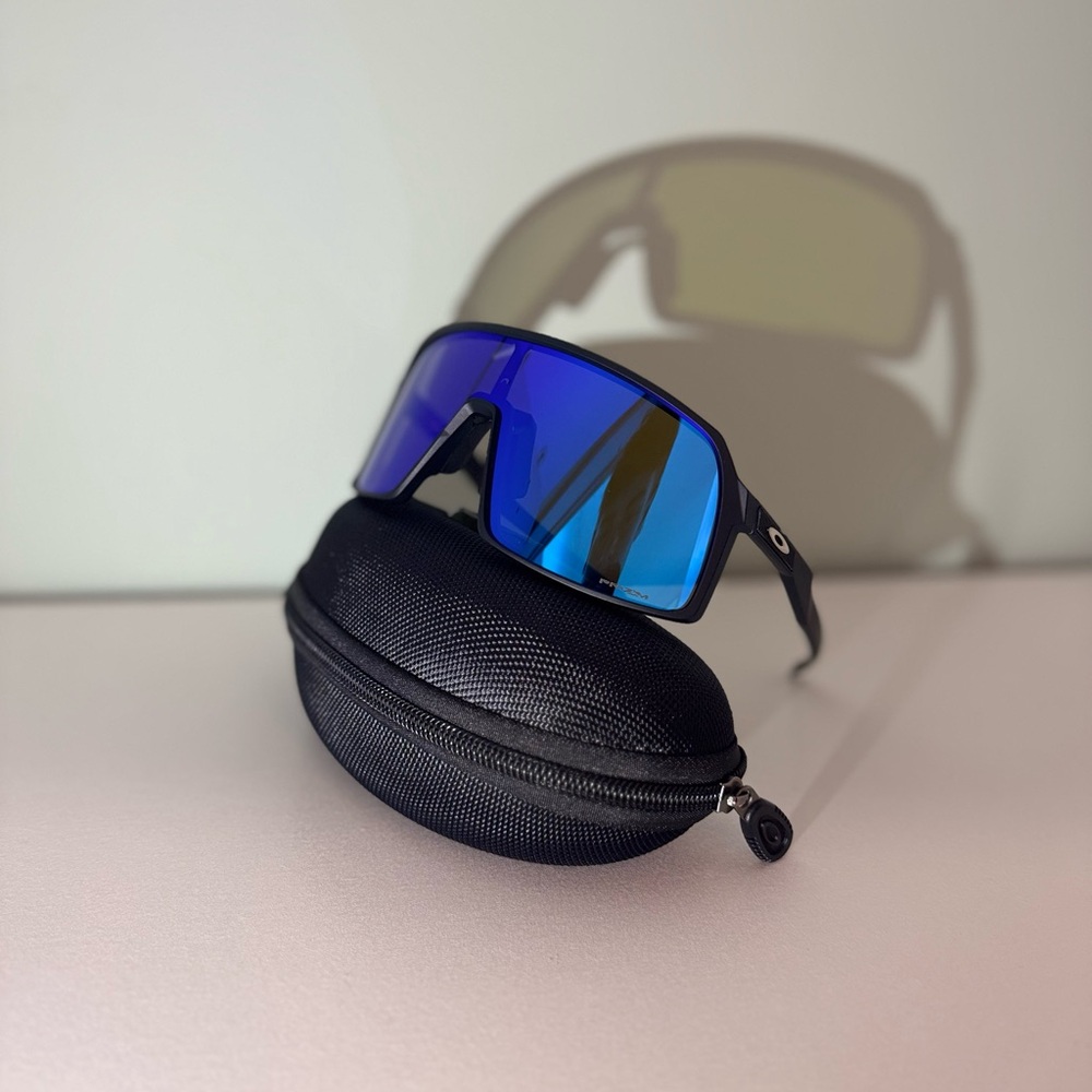 Oakley Black Frame Sunglasses with Blue Lenses